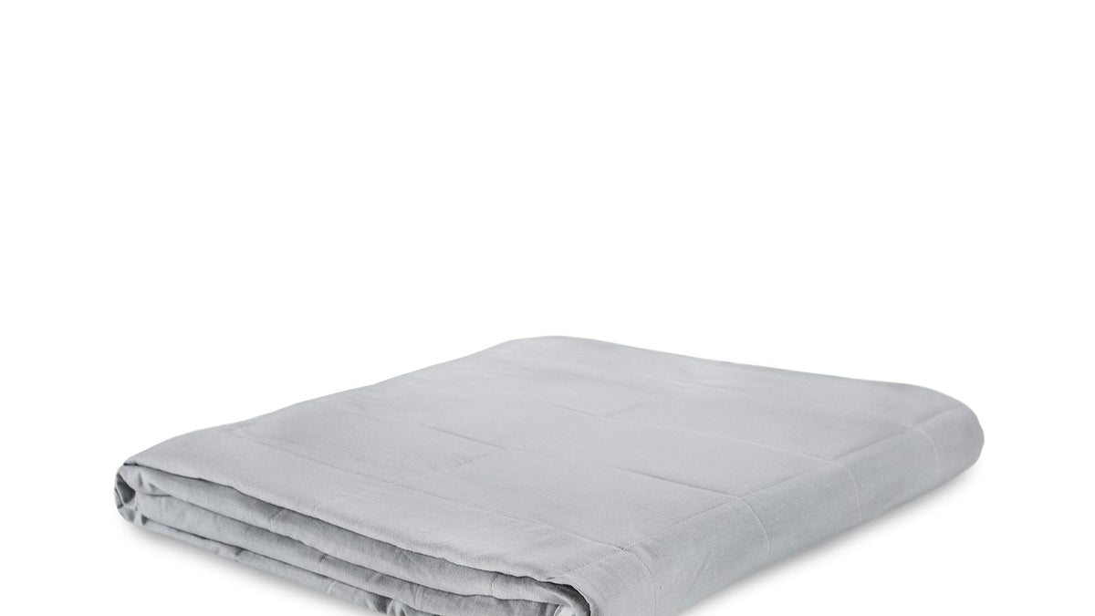 Couverture lestée grise pliée, fabrication européenne faite main