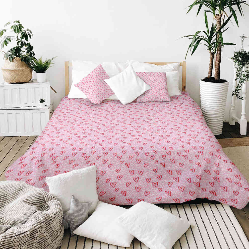 Housse à motifs pour couverture lestée, motif Rose 2, sur un lit