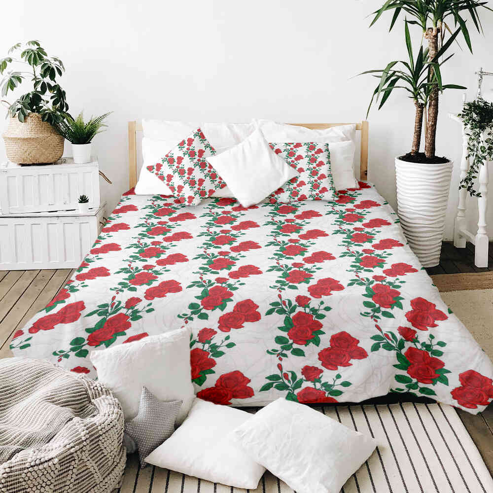 Housse à motifs pour couverture lestée, motif Des Roses, sur un lit
