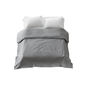 Housse à motifs pour couverture lestée, motif Grise été, sur un lit #Motif_Grise été