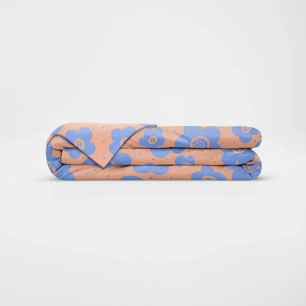 Couverture lestée Senso-Rex Kids motif Purple Field, grandes fleurs bleues sur fond pêche