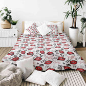 Housse à motifs pour couverture lestée, motif Embrasser, sur un lit #Motif_Embrasser