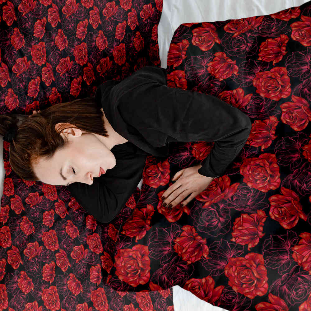 Housse à motifs pour couverture lestée, motif Rose 3, sur un lit