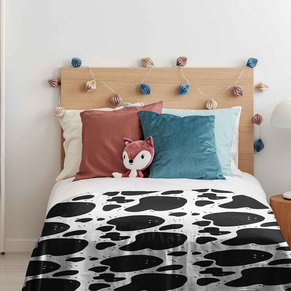 Housse à motifs pour couverture lestée enfant, imprimé Vachette, dans une chambre d'enfant
